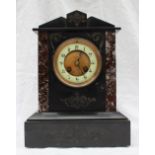 A 19th century black slate and marble mantle clock of architectural form,