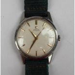A Gentleman's Omega automatic wristwatch, the silvered dial with raised gilt batons, to a