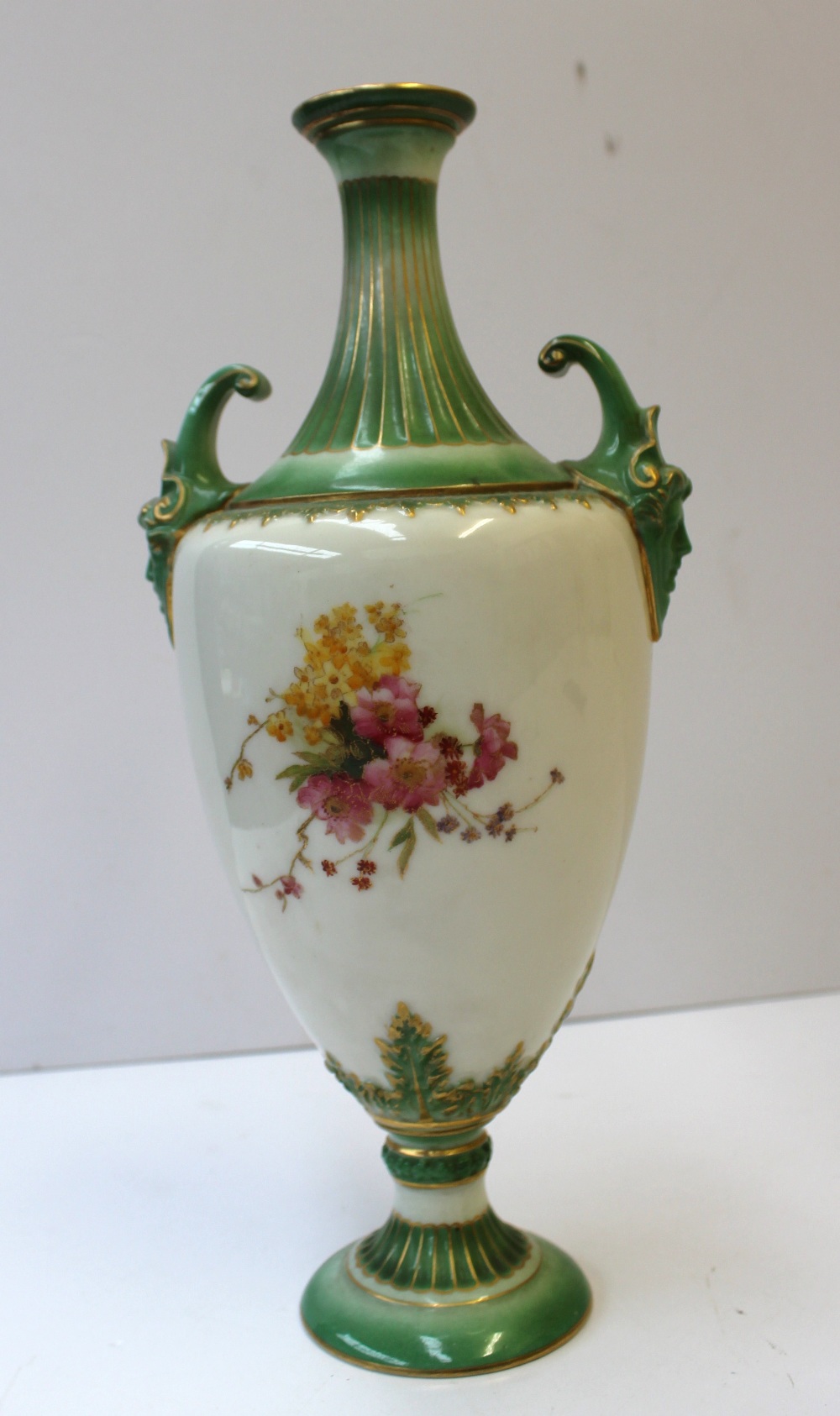 A Royal Worcester twin handled vase of ovoid shape with green ground, gilt lined fluted narrow - Image 3 of 5