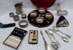 A set of four Edwardian silver cased open table salts with matching spoons, London, 1901,