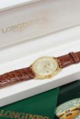 Longines - A gentleman's Longines stainless steel wristwatch, with a champagne dial, raised batons,