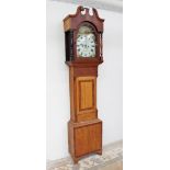 A 19th century oak longcase clock, the hood with a broken swan neck pediment and turned columns,