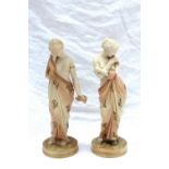 A pair of Royal Worcester figures, Love & Sorrow modelled as half naked young ladies with floral