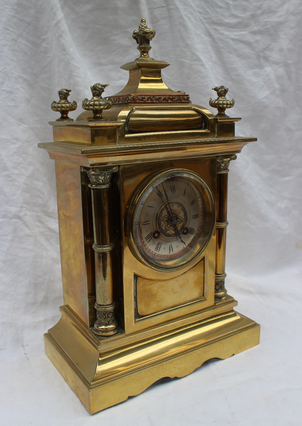 A 19th century brass mantle clock, with a domed top and flame finials, - Image 2 of 8