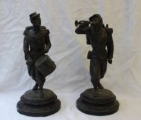 After Guillemin - a pair of spelter figures of soldiers, one playing a drum, the other a bugle,
