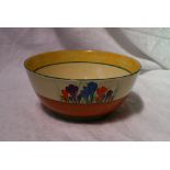 A Clarice Cliff pottery bowl, decorated in the crocus pattern, with a yellow and green band to the