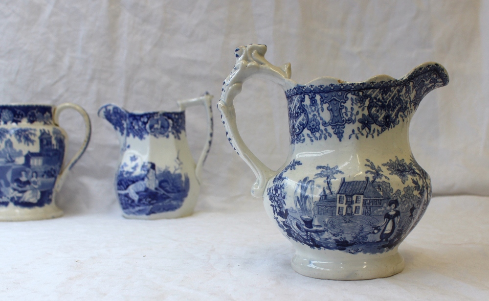 A 19th century pottery jug with blue and white transfer decoration of a setter with a game bird in - Image 8 of 9