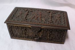 A bronze casket of rectangular form, cast with cherubs and flowers,