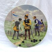 A Rembrandt guild charger, depicting Sir Francis Drake's game of bowls before the sighting of the