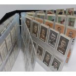 A lever arch file containing cigarette cards  including John Player & Sons - Arms & Armour -