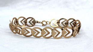 A yellow gold bracelet comprising spherical links with set square decoration, marked 9ct,