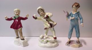 Three Royal Worcester porcelain figures, modelled by F G Doughty, including 'January', No.3452, '