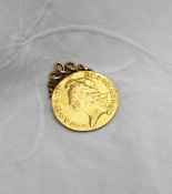 A George II gold two guinea coin, dated 1739, mounted, approximately 18.
