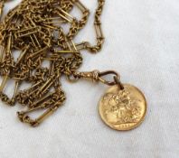 A yellow metal long chain with oval and twisted links, marked 15, approximately 54 grams,