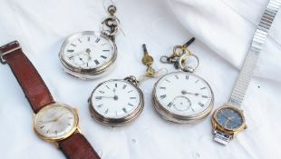 A silver open faced pocket watch together with two other silver pocket watches and two wristwatches