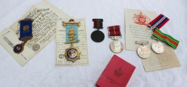 A George V British Empire medal,
