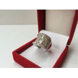 A diamond set dress ring, set with two rows of brilliant cut diamonds,