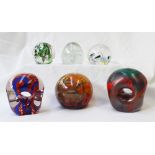 Two Karlin rushbrooke coloured glass paperweights,
