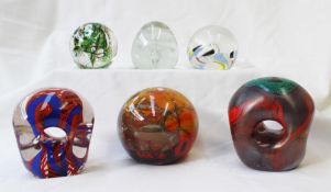 Two Karlin rushbrooke coloured glass paperweights,