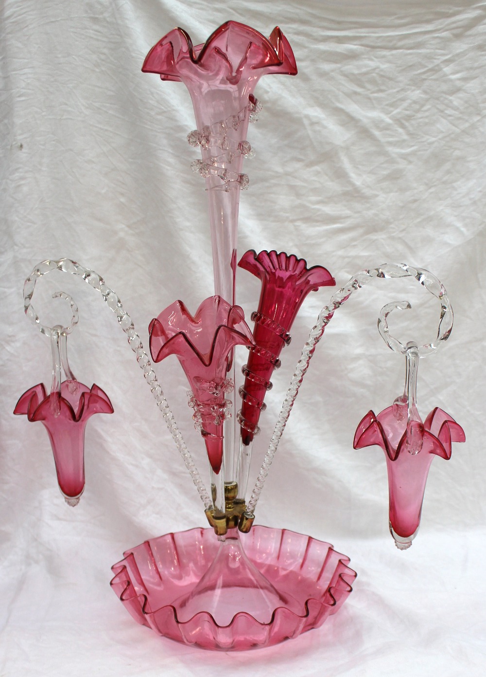 A Victorian cranberry glass epergne, with a central trumpet, three flared trumpets, three twisted - Image 3 of 3