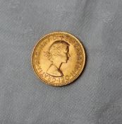 An Elizabeth II gold sovereign dated 1965