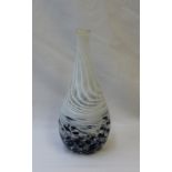 A Stuart Fletcher single stem glass vase decorated in whites and blues, signed to the base,