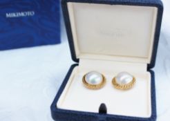 A pair of Mikomoto pearl clip on earrings,
