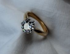 A solitaire diamond ring, the round old cut diamond, approximately 3 carats,