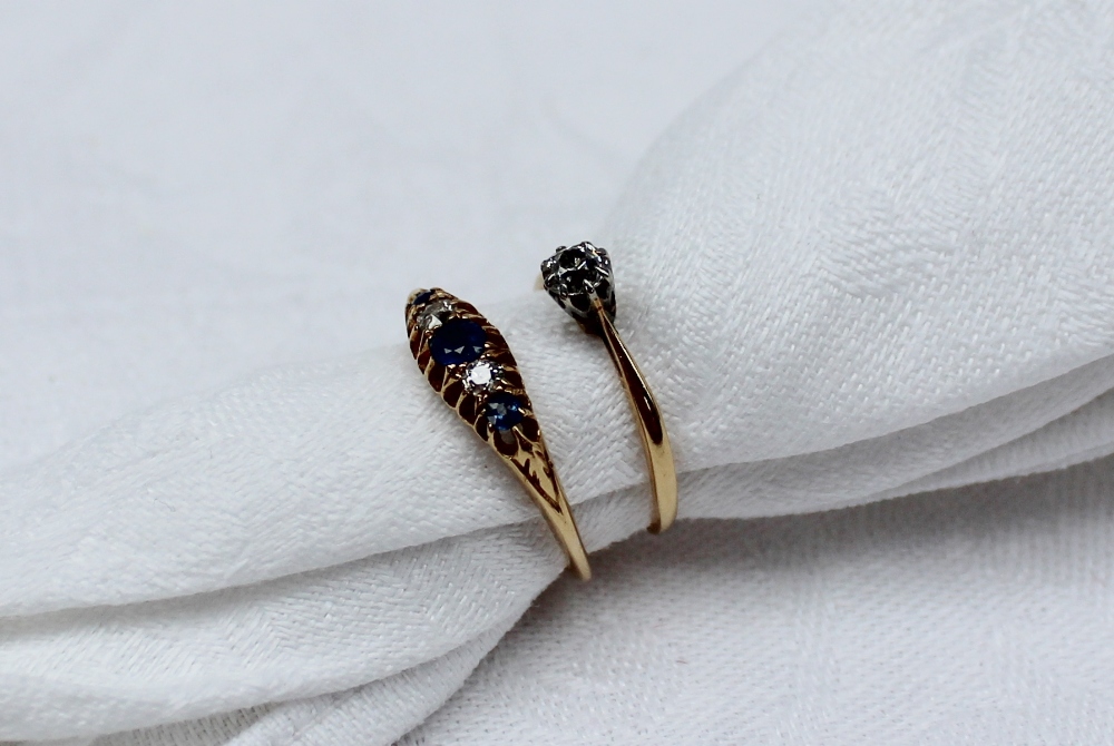 A sapphire and diamond gypsy ring set with three light blue sapphires and two old cut diamonds to - Image 2 of 4