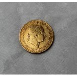 A George III gold sovereign,