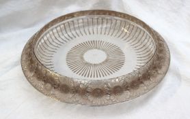 A Lalique marguerites pattern glass bowl, moulded with daisies to the rim , the base with line