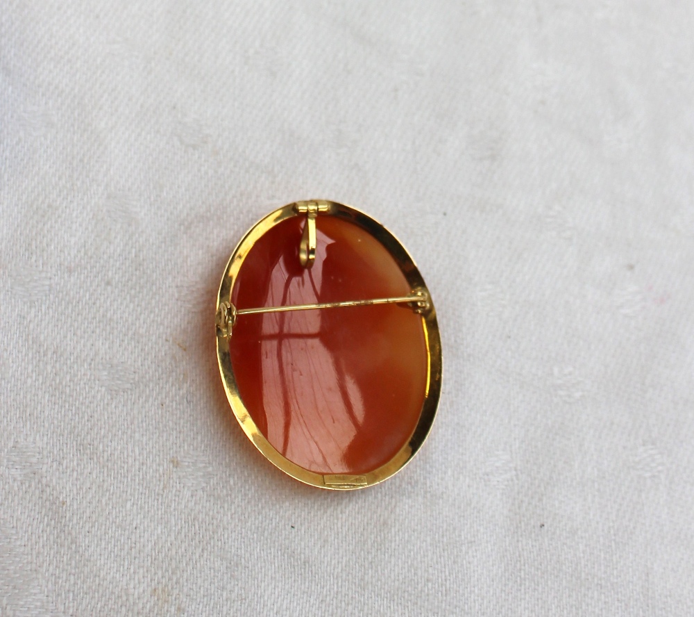 A shell cameo brooch of oval form depicting a lady in profile, to an 18ct yellow gold mount, - Image 3 of 4