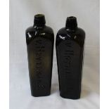 A pair of Hoytema & C green glass gin bottles on square tapering form,