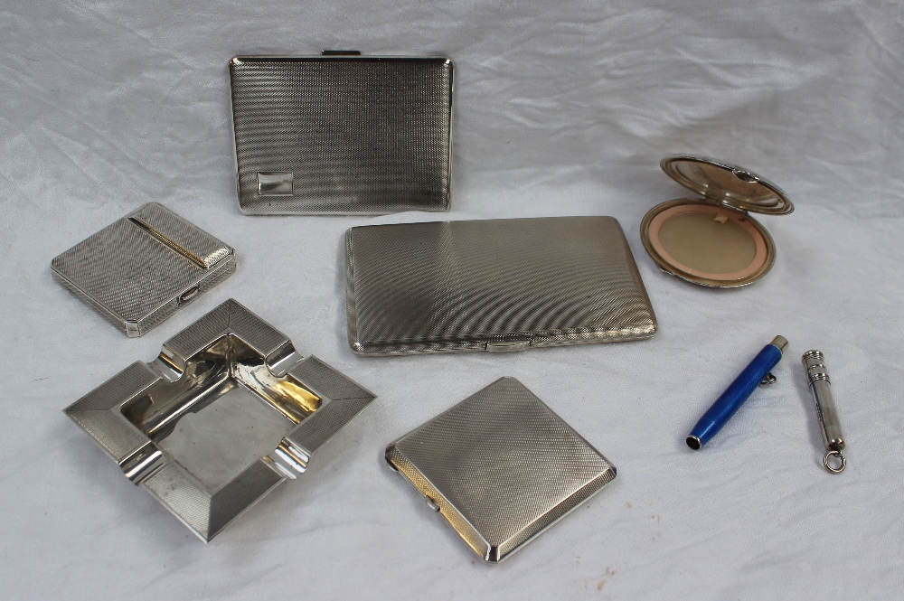 An Elizabeth II silver cigarette case of rectangular form, with engine turned decoration, - Image 2 of 3