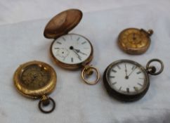 A lady's yellow metal keyless wound fob watch marked 18k with a gilt dial and Roman numerals,