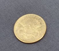 A 19th century Liberty Twenty dollar gold coin dated 1893, San Francisco mint mark, stamped J.B.L.