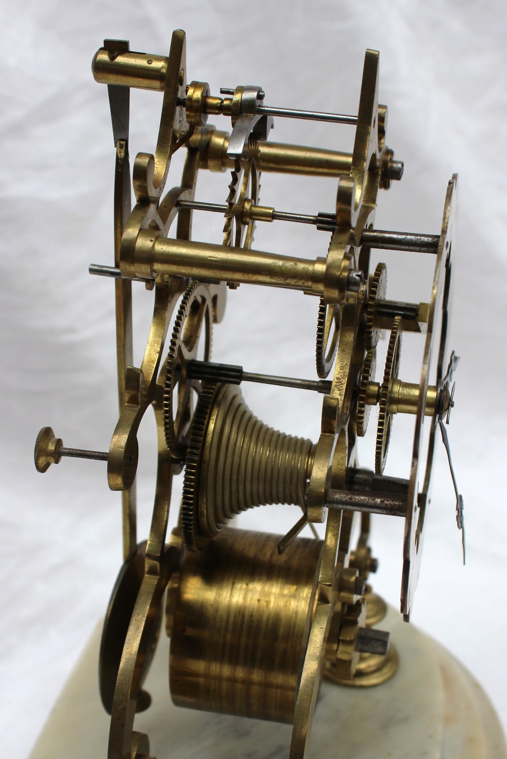 A 19th century brass skeleton clock, with a single fusee movement and Roman numerals, height 25cm, - Image 5 of 5