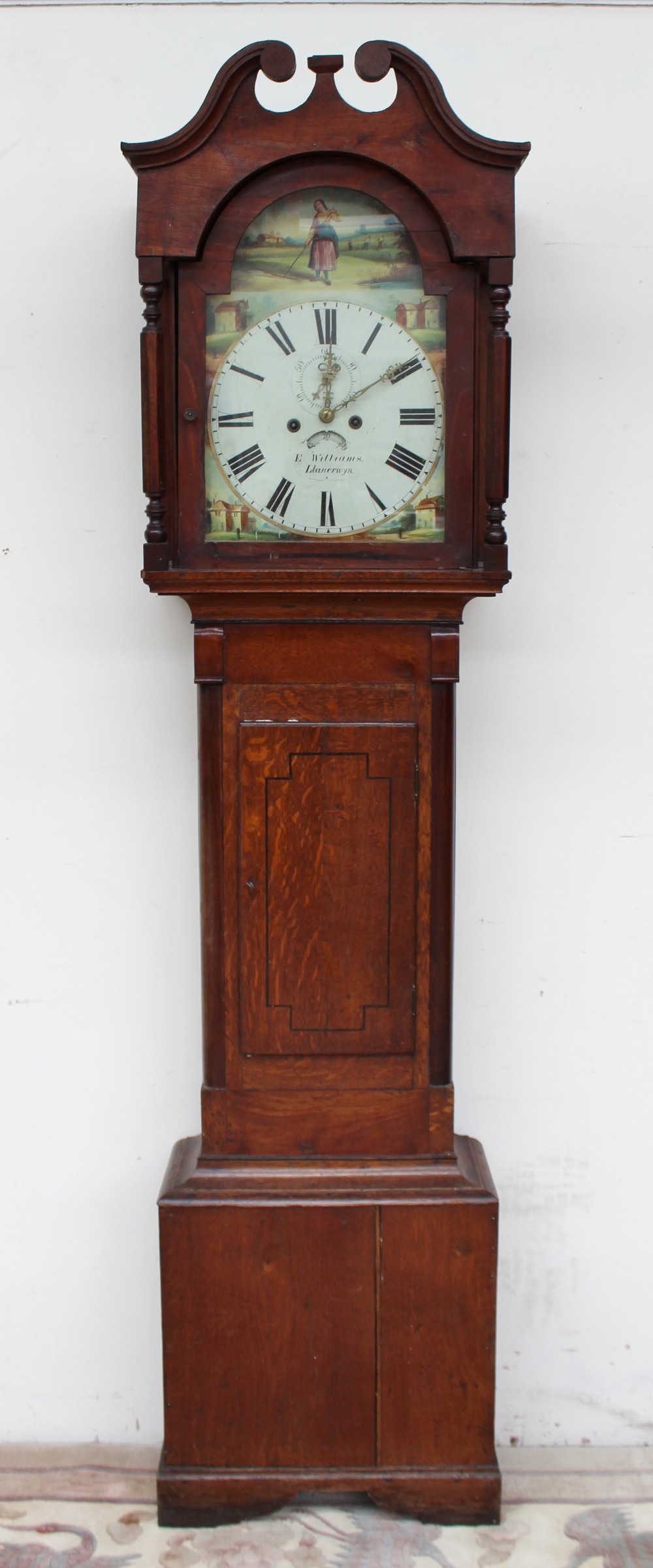 A 19th century oak and mahogany longcase clock,