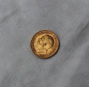 A George V gold half sovereign,