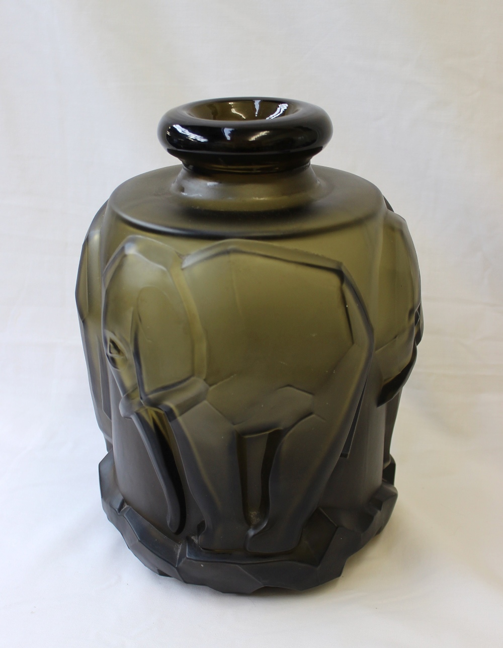 An Art Deco style green glass vase, moulded with elephants on a rocky base, - Image 2 of 4