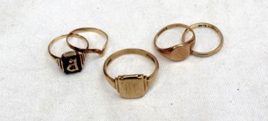 A 9ct gold signet ring, together with four 9ct gold rings,