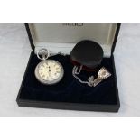Allan Martin - A Seiko Elnix white metal (marked silver) open faced pocket watch,