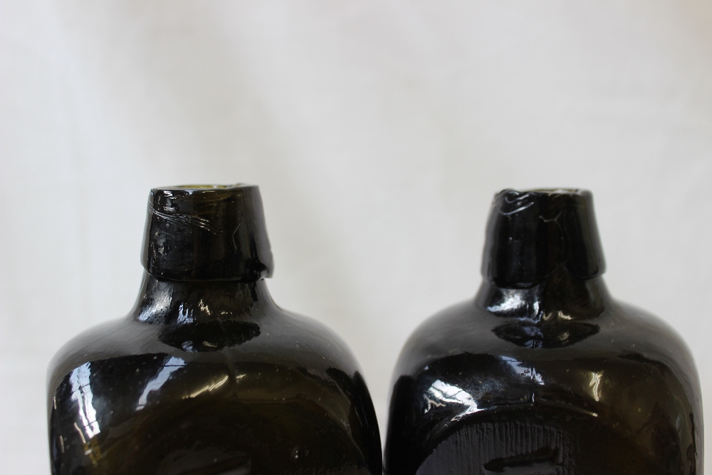 A pair of Hoytema & C green glass gin bottles on square tapering form, - Image 3 of 3