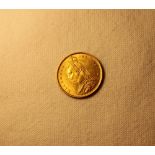 A Victorian gold shield back half sovereign dated 1887