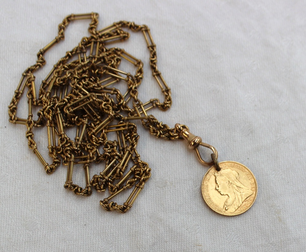 A yellow metal long chain with oval and twisted links, marked 15, approximately 54 grams, - Image 2 of 3