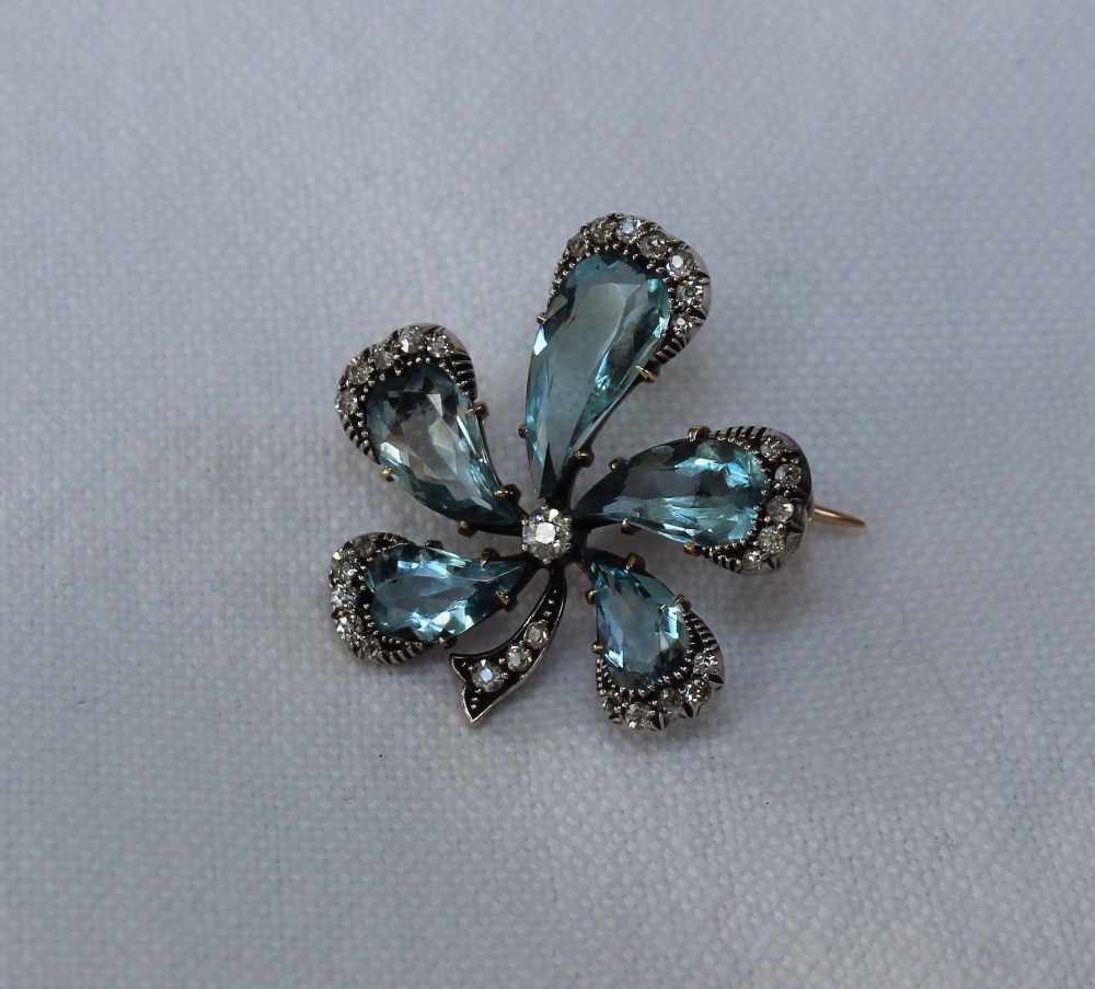 An aquamarine and diamond brooch of floral form with five tear drop shaped aquamarines, the centre - Image 2 of 4