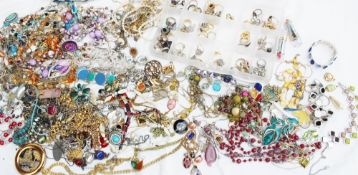 A large quantity of costume jewellery including necklaces, rings,