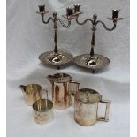 An Art Deco style electroplated four piece tea set of cylindrical form with angular handles marked