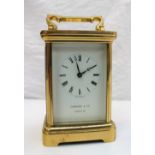 A 20th century brass cased carriage timepiece,