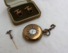 A gold plated half hunter keyless wound pocket watch,